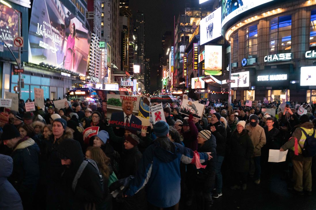 Protesters march in NYC calling for the impeachment of President Donald Trump.